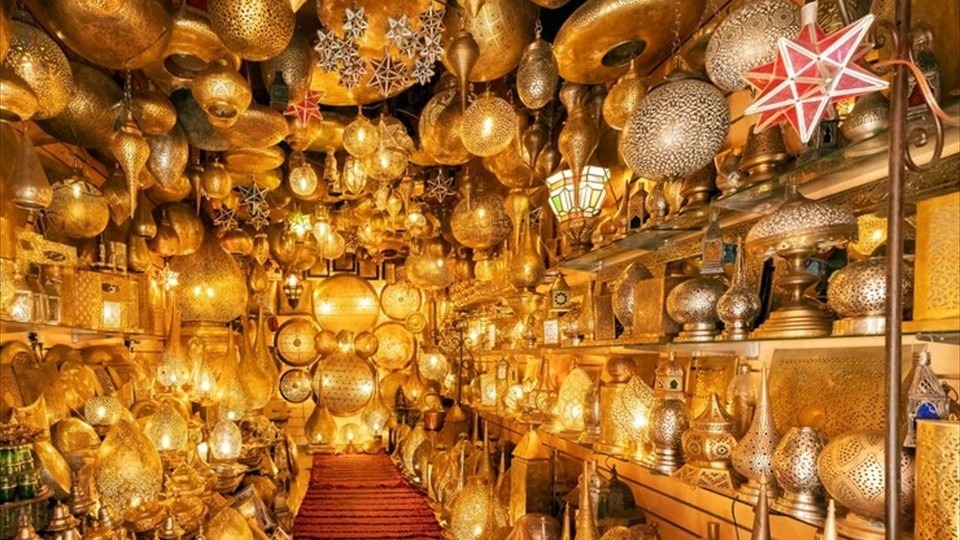 Copper lighting and chandeliers store at a market in Marrakech